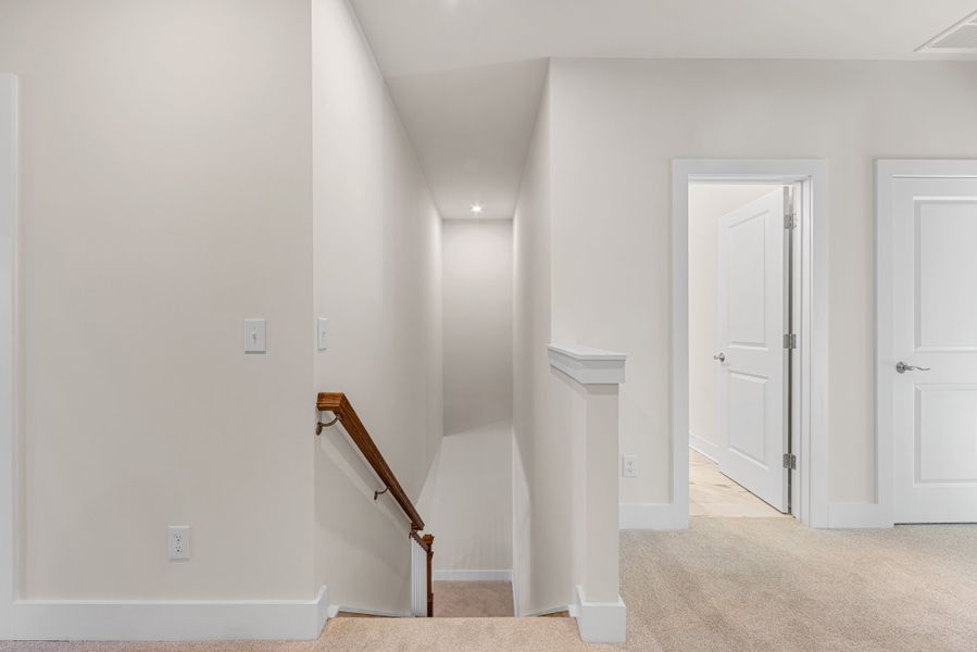 Spacious, unfurnished interior of a new home in Seven Oaks, Belmont (Image 27).