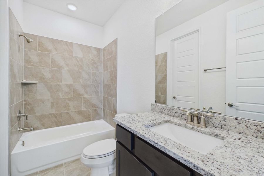 Representative furnished interior of a home built from the The Danbury I by Davidson Homes LLC in The Reserve at Potranco Oaks, Castroville (Image 32).