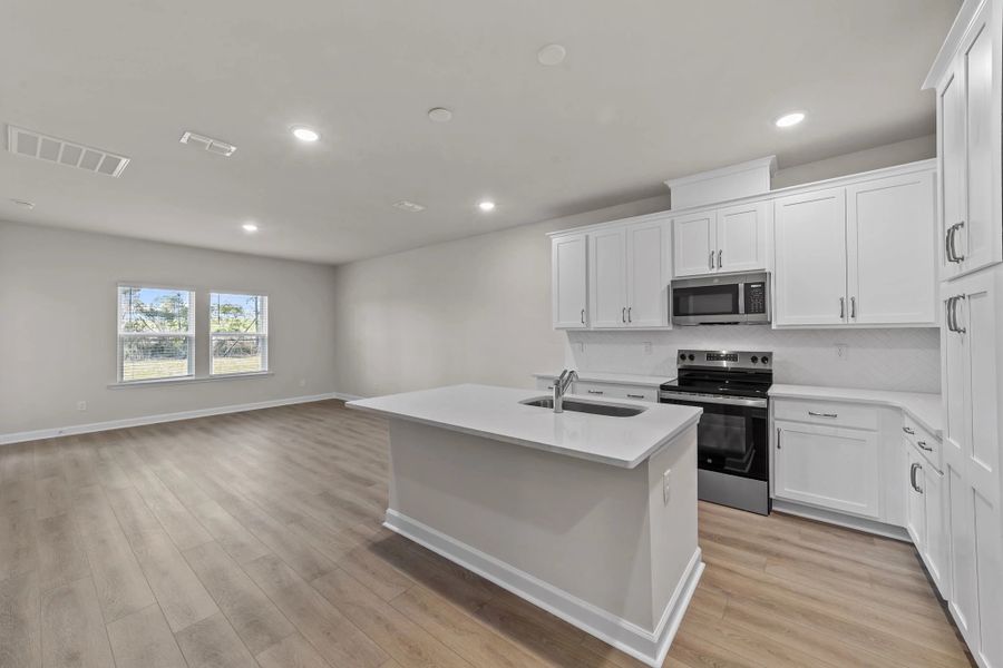 Similar Palmetto floorplan with Timeless finishes at a nearby community