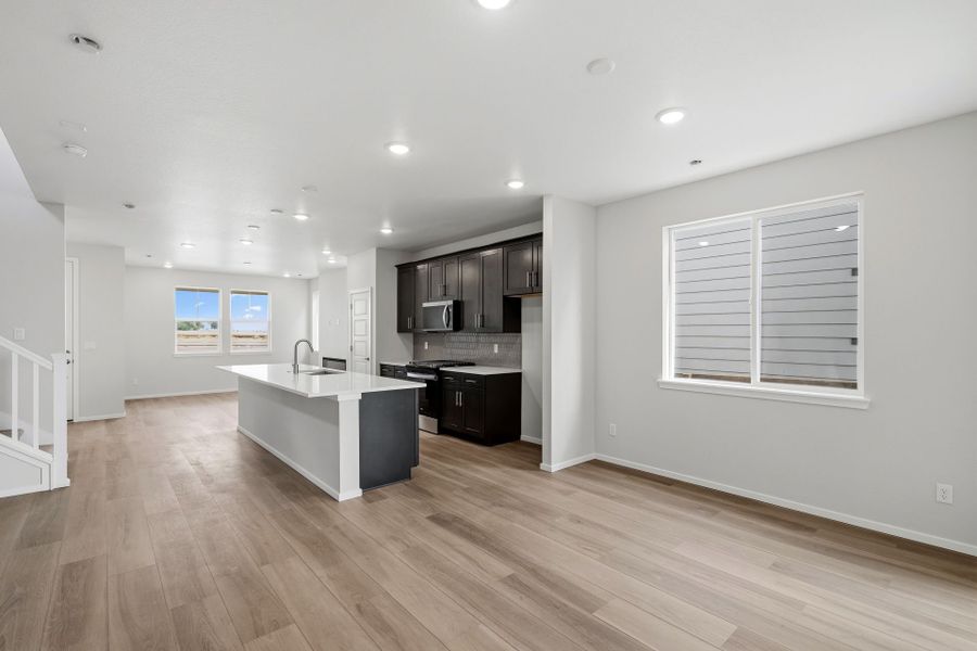 Furnished interior view inside a new home in Barefoot Village, Firestone (Image 6).