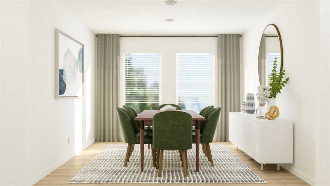 Dining area with light hardwood / wood-style floors