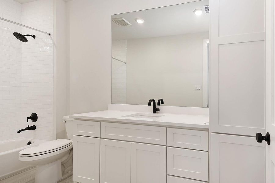 Furnished interior view inside a new home in , The Woodlands (Image 11). Furnished interior view inside a new home in , The Woodlands (Image 11).