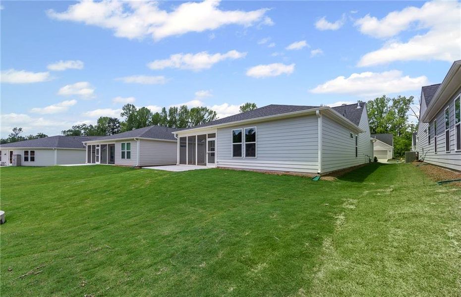 Front exterior of a new home in Sun City Peachtree, Griffin, GA, highlighting curb appeal (Image 16).