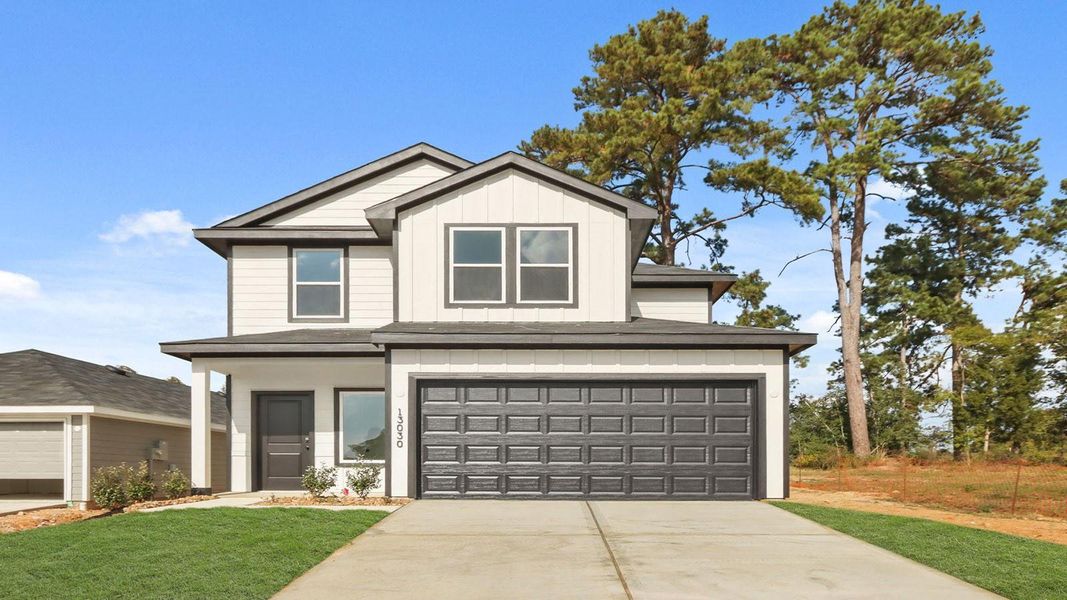 Front exterior of a new home in Lake Conroe Cove, Willis, TX, highlighting curb appeal (Image 1). Front exterior of a new home in Lake Conroe Cove, Willis, TX, highlighting curb appeal (Image 1).
