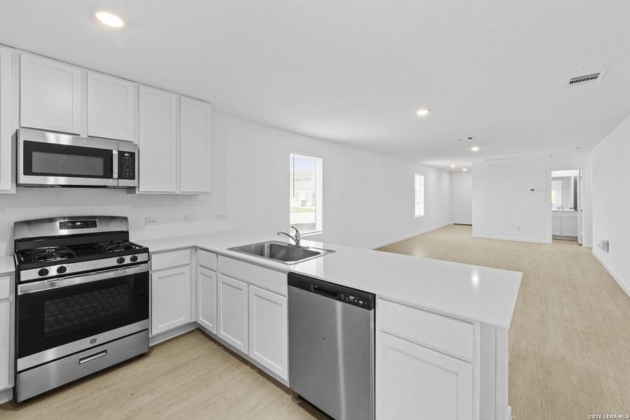 Furnished interior view inside a new home in Spring Grove, San Antonio (Image 7).