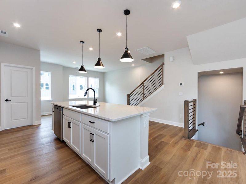 Large Central Island Provides the Ideal Space for Casual Dining