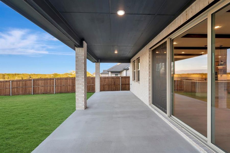 Exterior details and patio area of a home in Elevon, Lavon (Image 22).