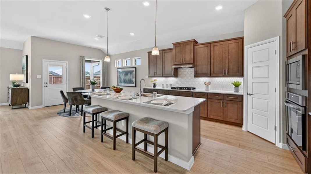 Kitchen - All Home and community information, including pricing, included features, terms, availability and amenities, are subject to change at any time without notice or obligation. All Drawings, pictures, photographs, video, square footages, floor plans, elevations, features, colors and sizes are approximate for illustration purposes only and will vary from the homes as built.