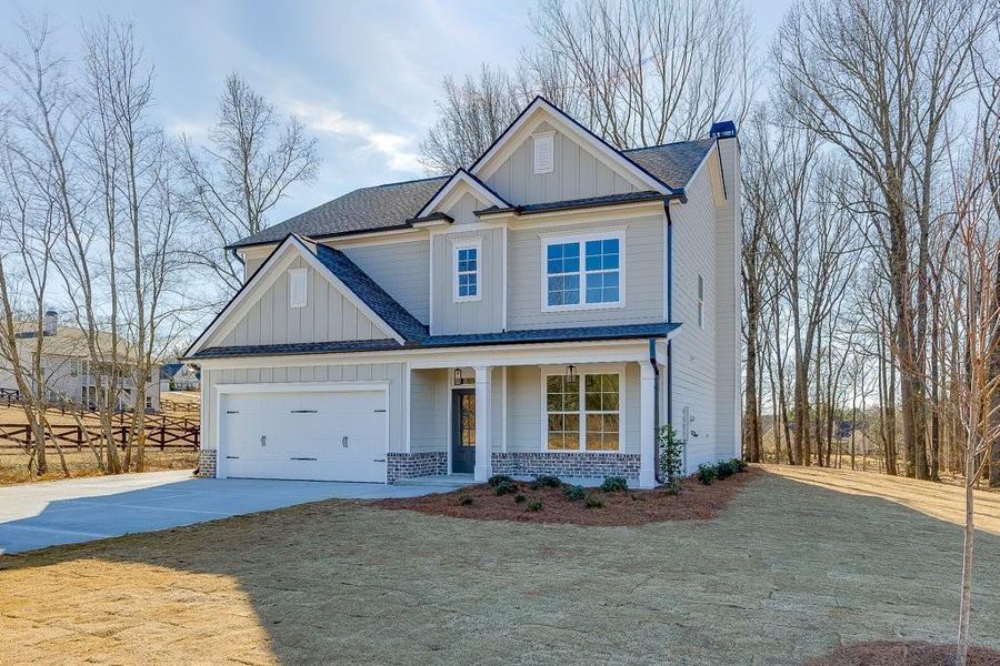Front exterior of a new home in , Jefferson, GA, highlighting curb appeal (Image 24).