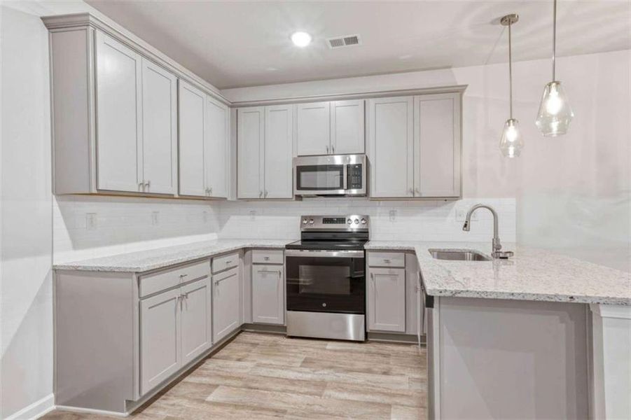 Furnished interior view inside a new home in Parkway James, Snellville (Image 2). Furnished interior view inside a new home in Parkway James, Snellville (Image 2).