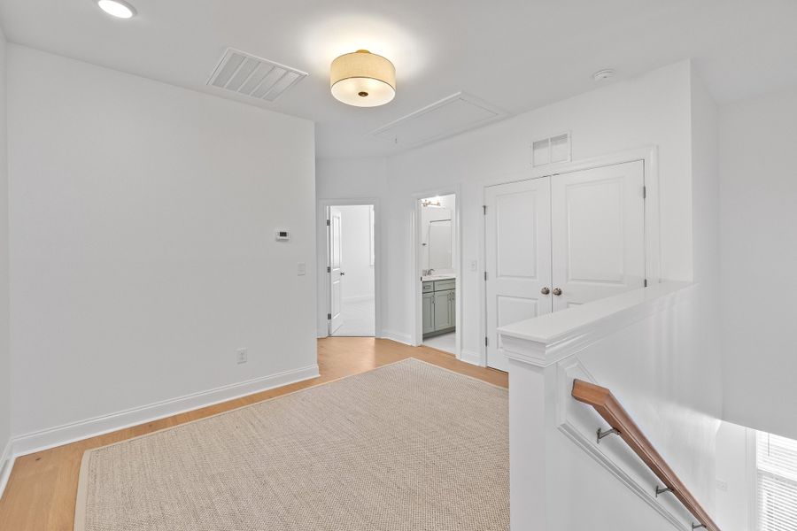 Representative unfurnished interior of a home built from the The Juniper by RobuckHomes in Kennebec Crossing, Angier (Image 79).