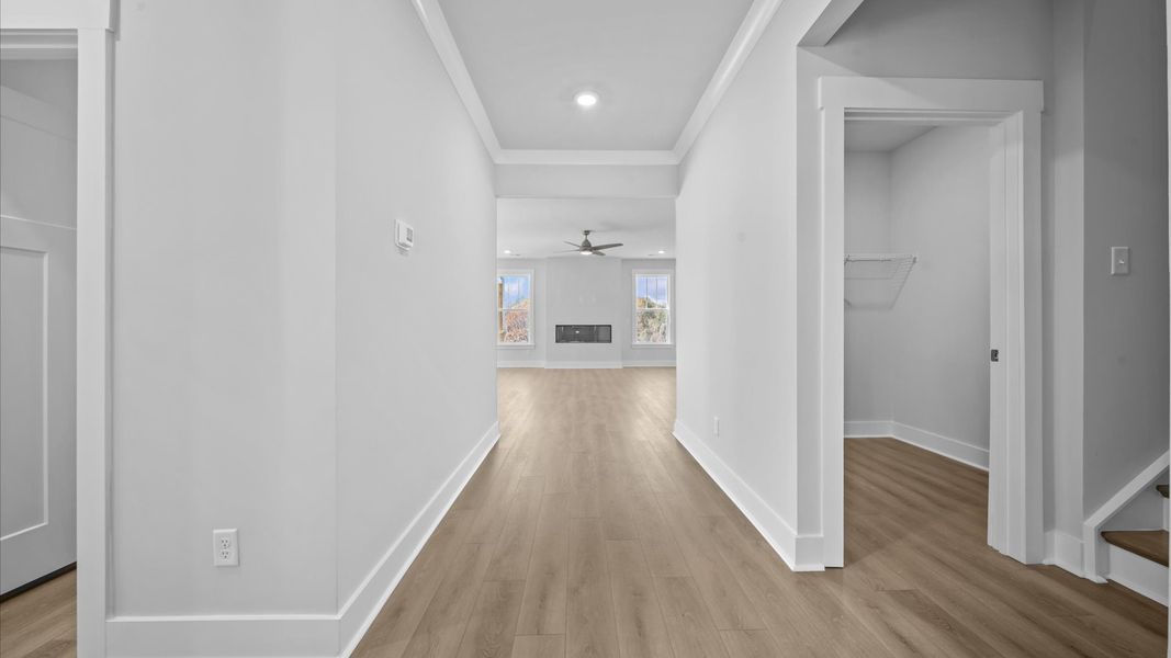 Eye-catching entry with hardwood flooring and a bright, inviting atmosphere