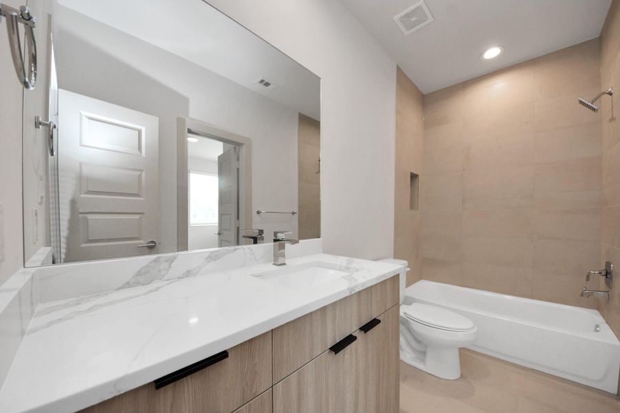 Furnished interior view inside a new home in Agua, Houston (Image 3). Furnished interior view inside a new home in Agua, Houston (Image 3).