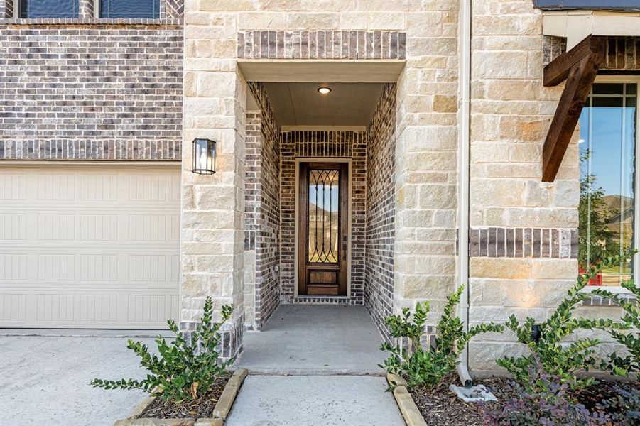 Exterior details and patio area of a home in Woodstone, Providence Village (Image 3). Exterior details and patio area of a home in Woodstone, Providence Village (Image 3).