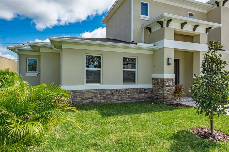 Exterior details and patio area of a home in , Palm Harbor (Image 23).