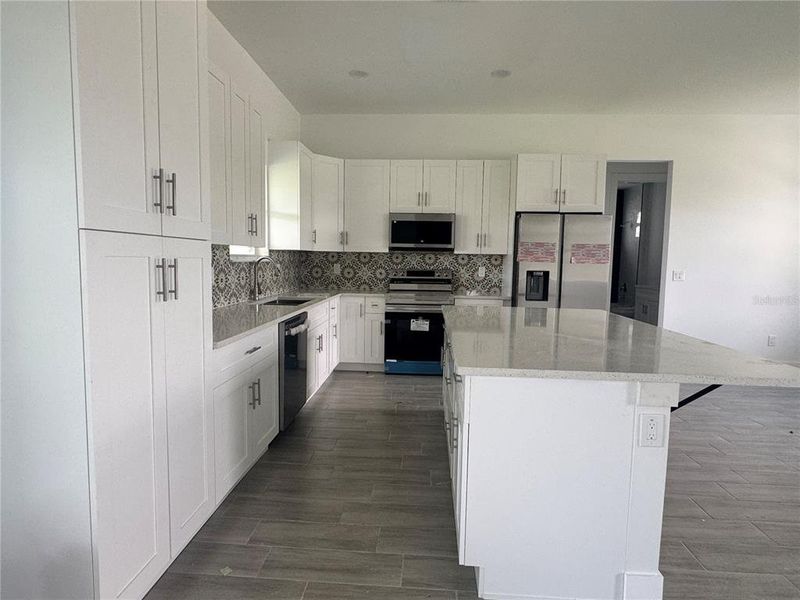 Furnished interior view inside a new home in , Port Charlotte (Image 10).