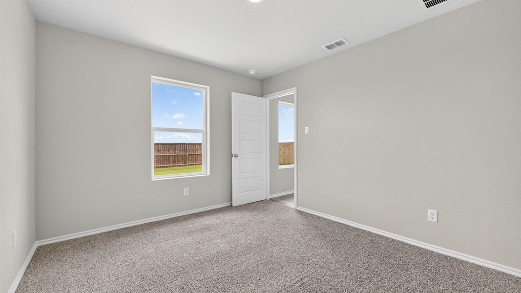 Spacious, unfurnished interior of a new home in Monarch at the Meadows, Ponder (Image 19).