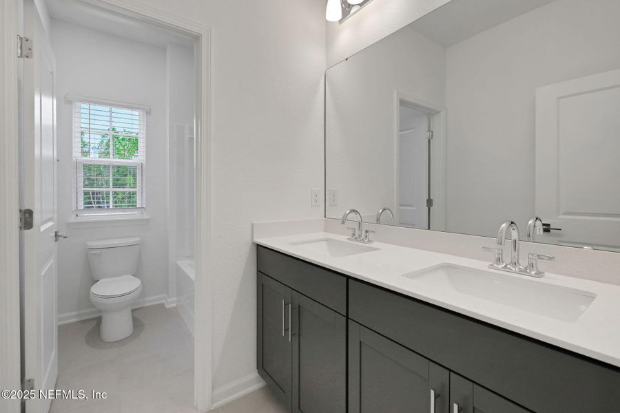 Furnished interior view inside a new home in Brook Forest - Single Family Homes, St. Augustine (Image 8). Furnished interior view inside a new home in Brook Forest - Single Family Homes, St. Augustine (Image 8).