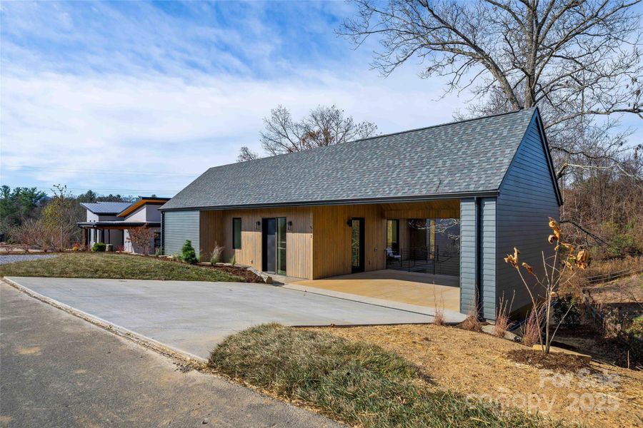 Exterior details and patio area of a home in , Asheville (Image 27).