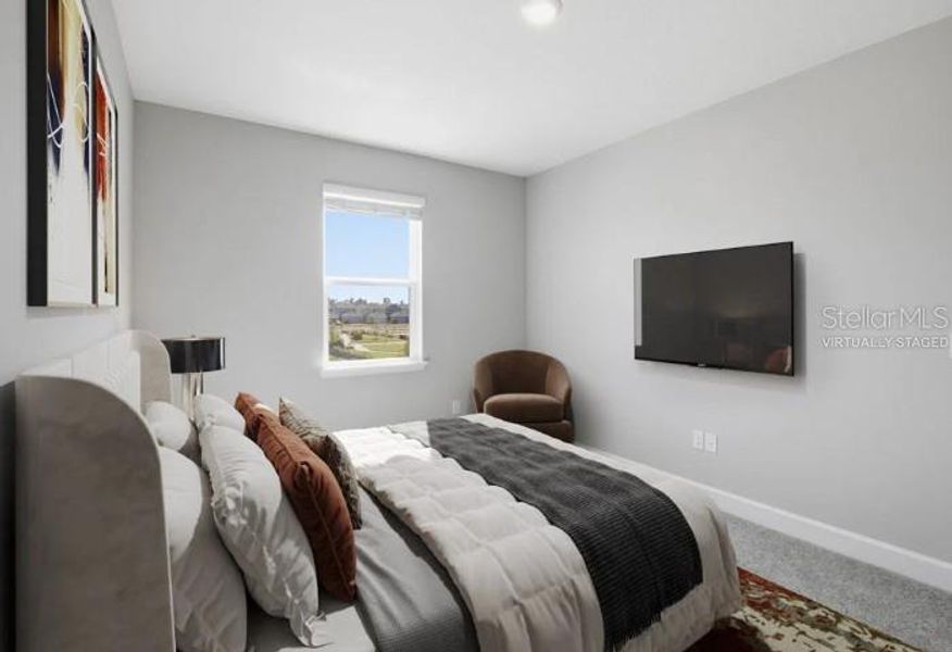 Furnished interior view inside a new home in Harvest at Ovation, Winter Garden (Image 5).