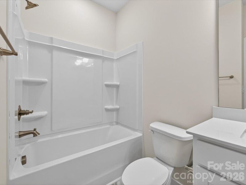 Furnished interior view inside a new home in Central Living at Craig, Charlotte (Image 5).