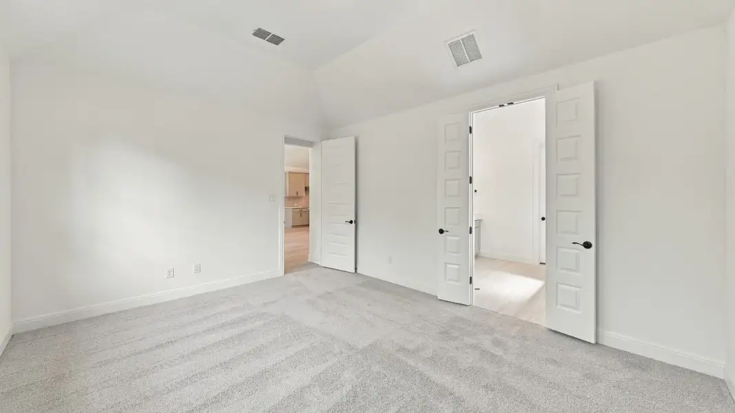 Furnished interior view inside a new home in Oaks at San Gabriel, Georgetown (Image 18).