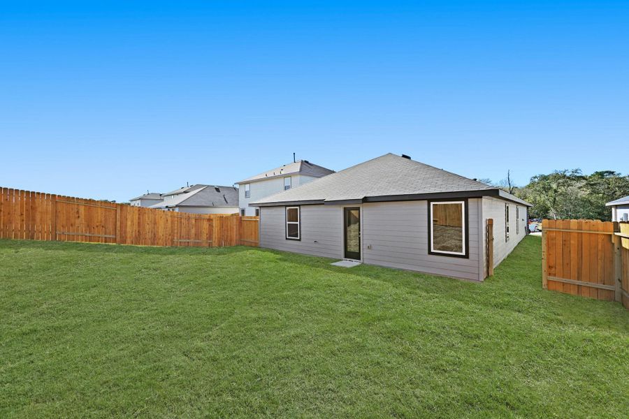 Exterior details and patio area of a home in Lexington Heights, Willis (Image 13).
