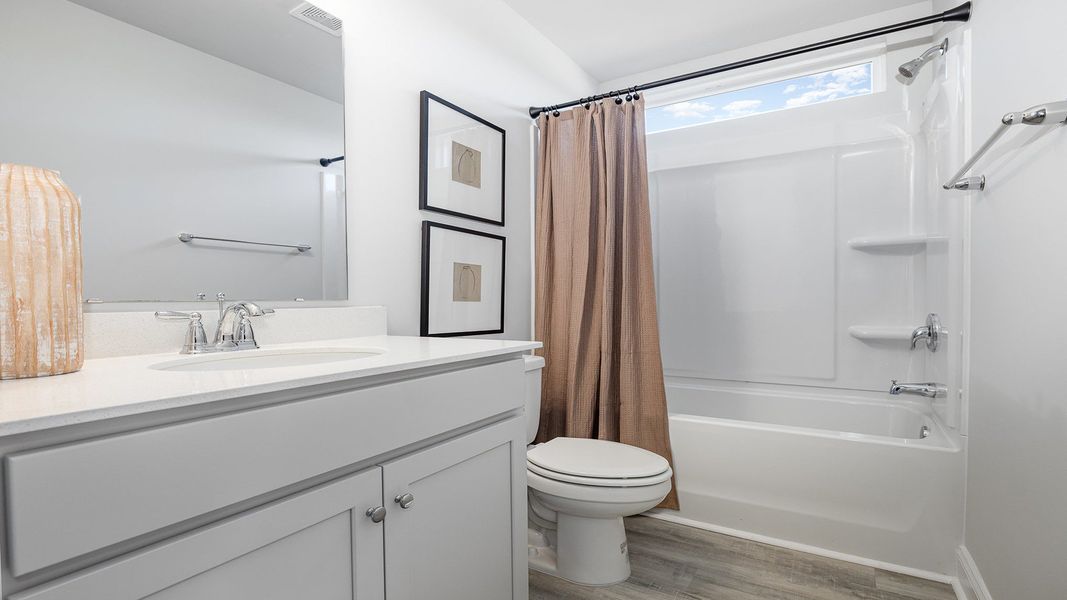 Representative furnished interior of a home built from the TILLMAN by D.R. Horton in Auberon Woods, Conway (Image 27).