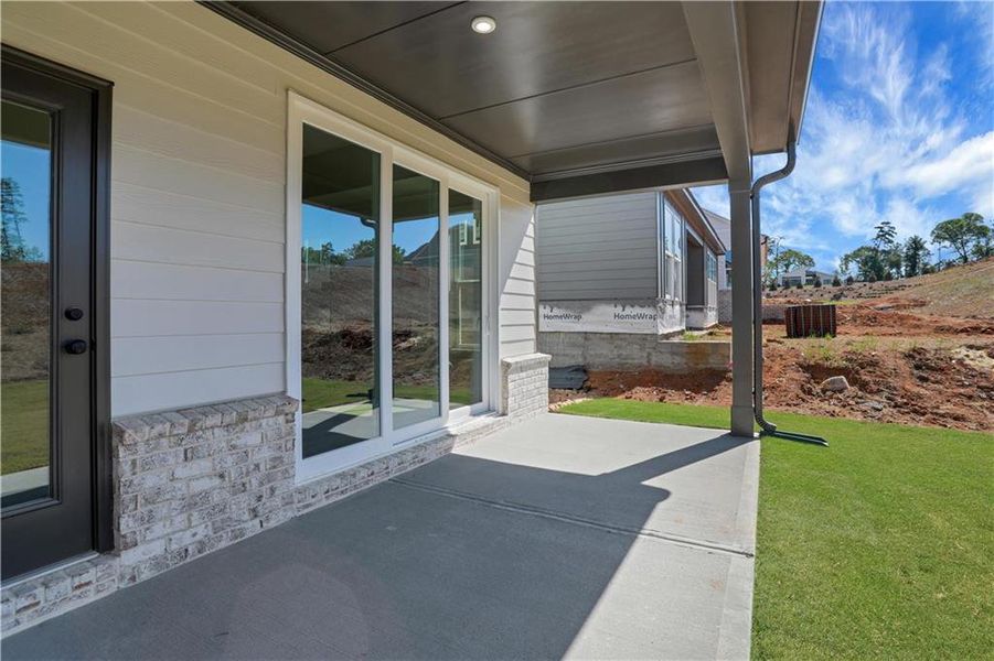 Exterior details and patio area of a home in Gatherings® at GreenHouse, Marietta (Image 3).