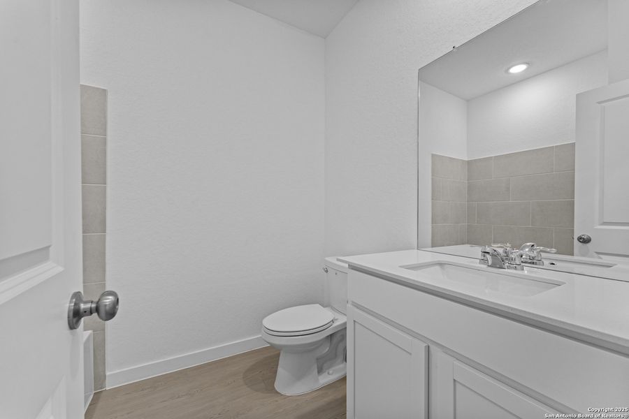 Furnished interior view inside a new home in Hidden Trails: Coastline Collection, Bulverde (Image 6).