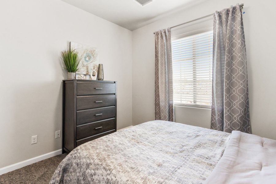 Representative furnished interior of a home built from the Valencia by Hakes Brothers in Hillside Park, El Paso (Image 33).