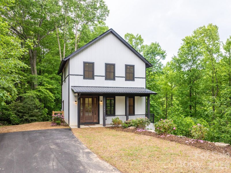 Front exterior of a new home in , Boone, NC, highlighting curb appeal (Image 21). Front exterior of a new home in , Boone, NC, highlighting curb appeal (Image 21).