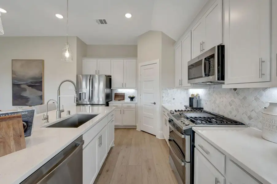 Furnished interior view inside a new home in Sorella, Tomball (Image 5).