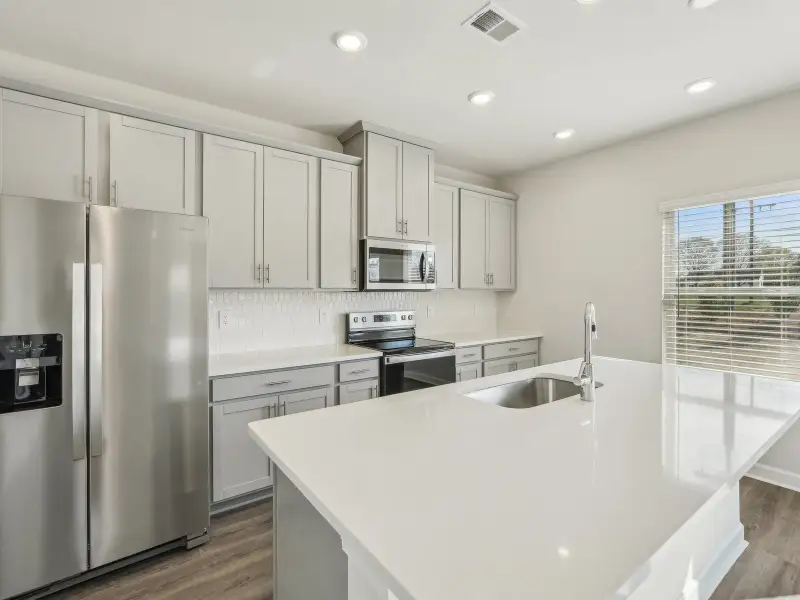 Furnished interior view inside a new home in Harper Landing, Stanley (Image 5).