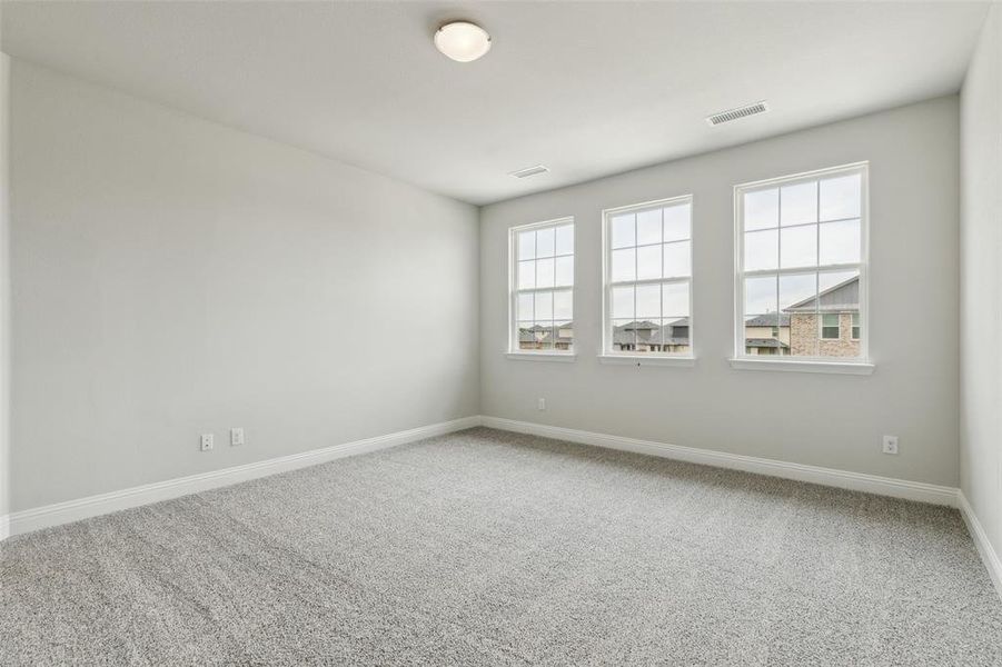 Spacious, unfurnished interior of a new home in Santorini, Seagoville (Image 15).