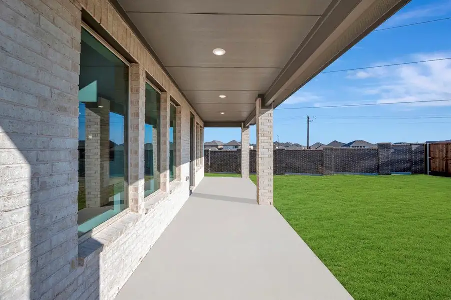 Exterior details and patio area of a home in Lilyana, Celina (Image 2). Exterior details and patio area of a home in Lilyana, Celina (Image 2).