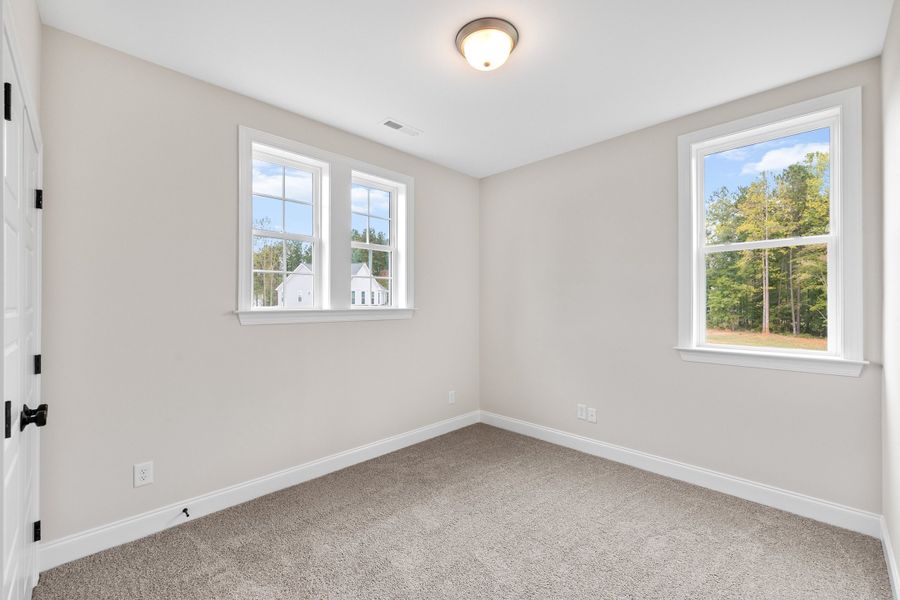 Representative unfurnished interior of a home built from the The Chandler by RobuckHomes in Baylee Ridge, Selma (Image 201).