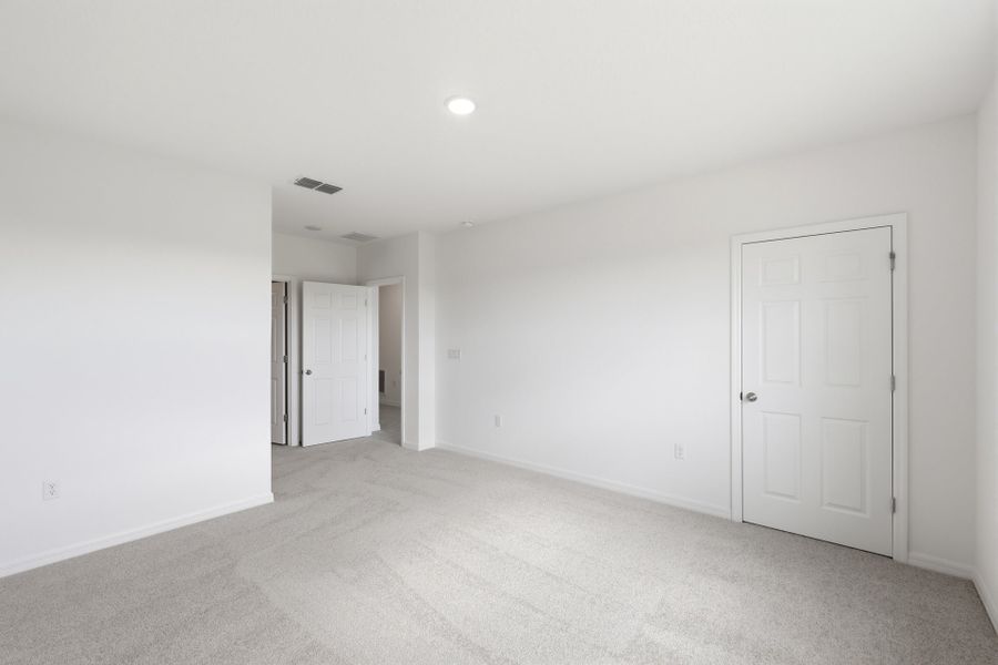 Spacious, unfurnished interior of a new home in Highfield at Twisted Oaks, Wildwood (Image 14).
