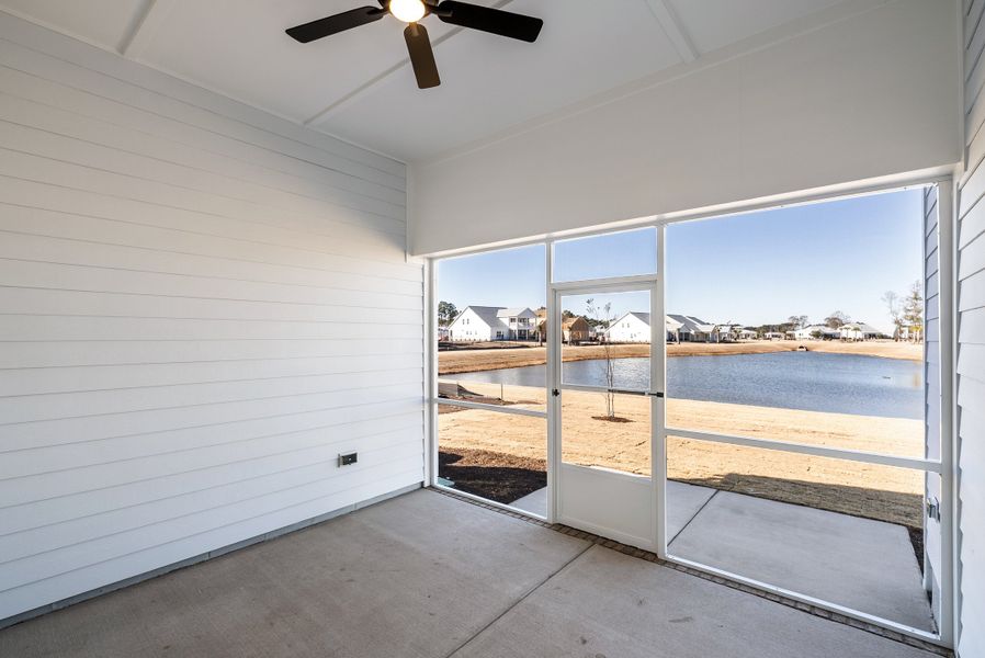 Exterior details and patio area of a home in The Sanctuary at Sunset Beach, Sunset Beach (Image 22).
