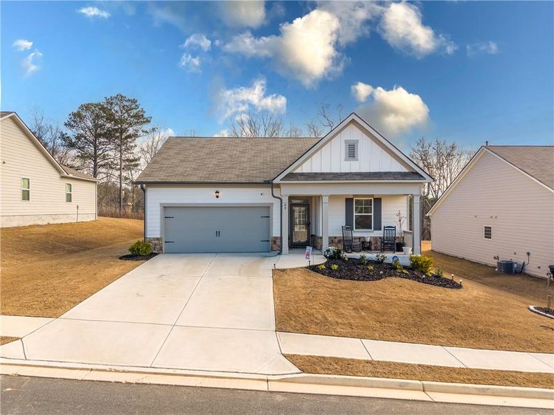 Front exterior of a new home in Lost Creek, Dallas, GA, highlighting curb appeal (Image 27).