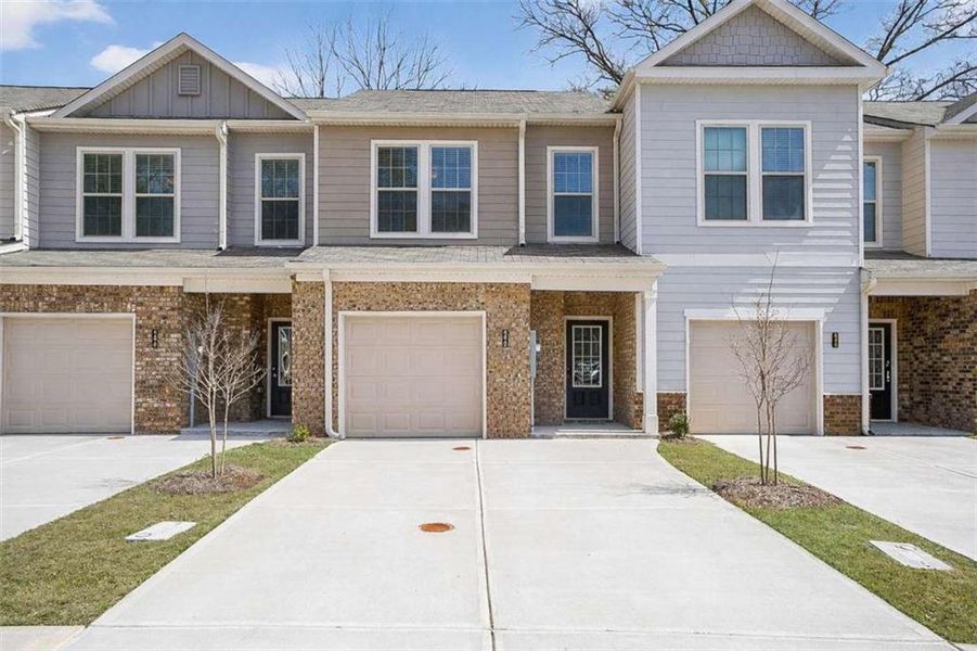 Front exterior of a new home in , South Fulton, GA, highlighting curb appeal (Image 2).