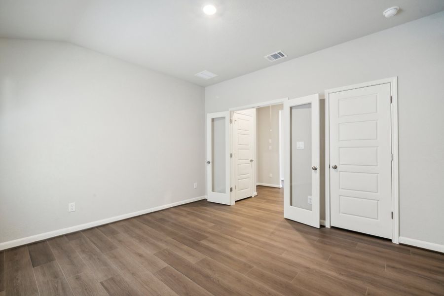 Game room in the Fitzhugh floorplan in a Meritage Homes community.