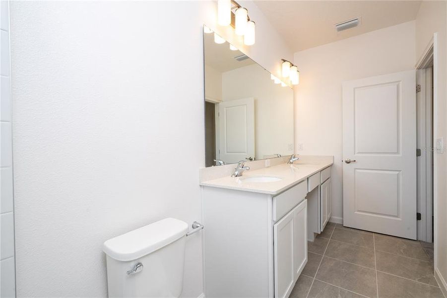 Furnished interior view inside a new home in Paradiso Grande, Orlando (Image 19).