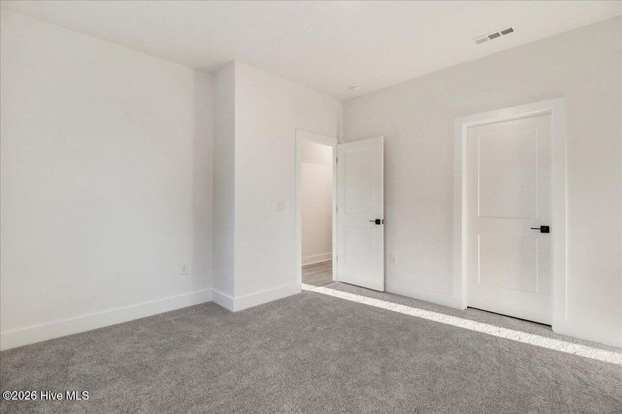 Spacious, unfurnished interior of a new home in Wood Creek, Leland (Image 26).