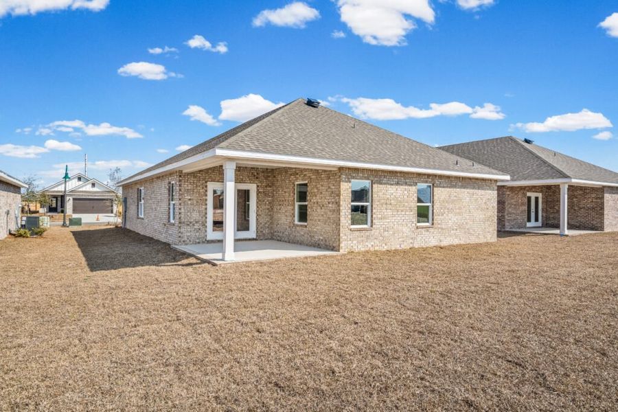 Exterior details and patio area of a home in Natureview, Freeport (Image 20).