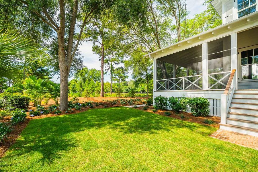 Exterior details and patio area of a home in , Johns Island (Image 11). Exterior details and patio area of a home in , Johns Island (Image 11).