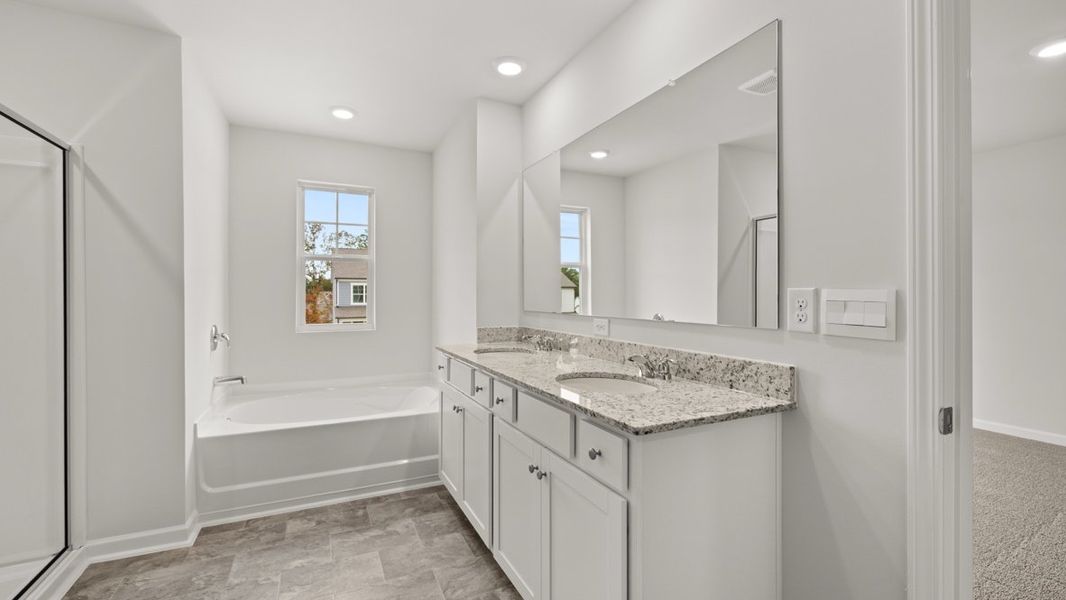 Representative furnished interior of a home built from the Hayden by D.R. Horton in Liberty Crossing, Braselton (Image 10).
