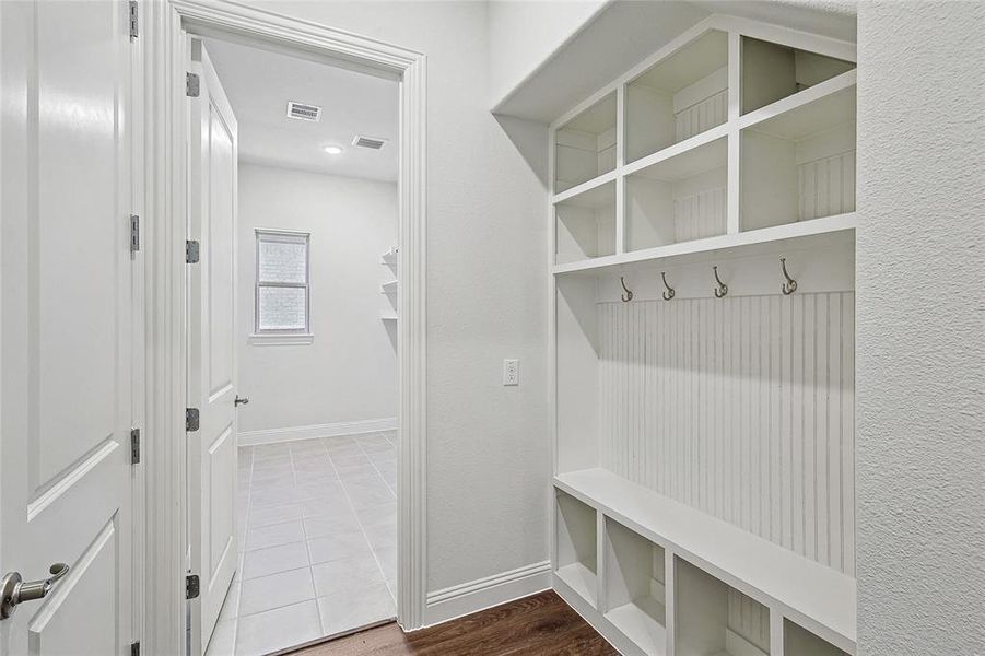 Mudroom featuring hardwood / wood-style flooring