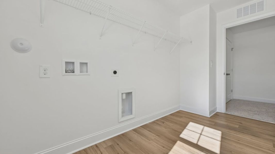 Furnished interior view inside a new home in Sidney Creek Single Family, Zebulon (Image 47).