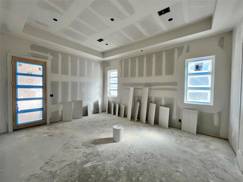 Empty room with a raised ceiling